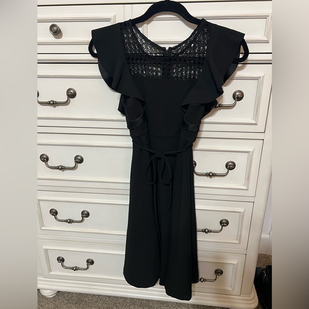 Black dress ruffle detail, zip back and tie waist